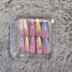 Yellow blue and pink nails