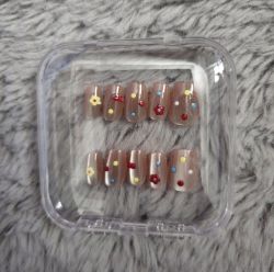 Brown with multicolour dots and flowers nails
