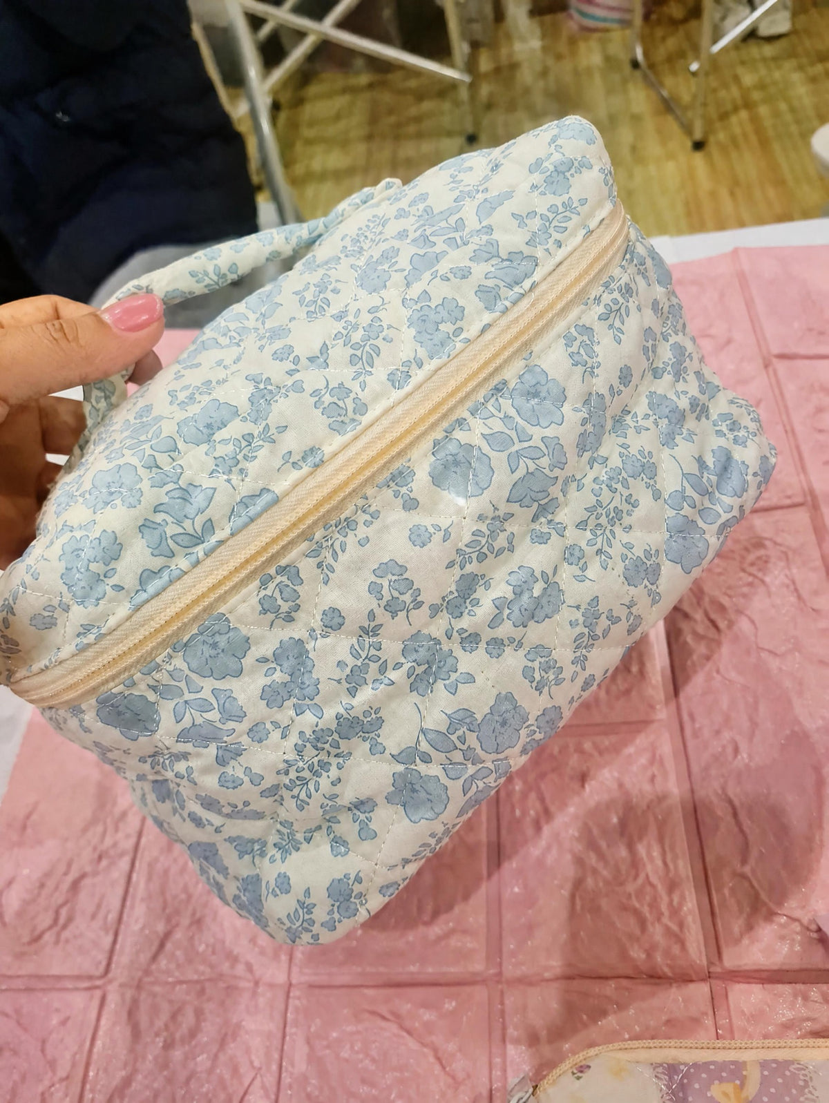 Blue quilted floral design bag