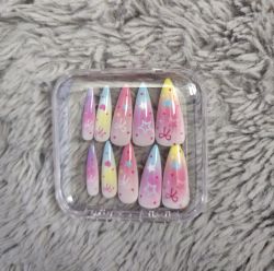 Multicolour bow and stars nails