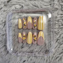 Yellow floral stripe nails